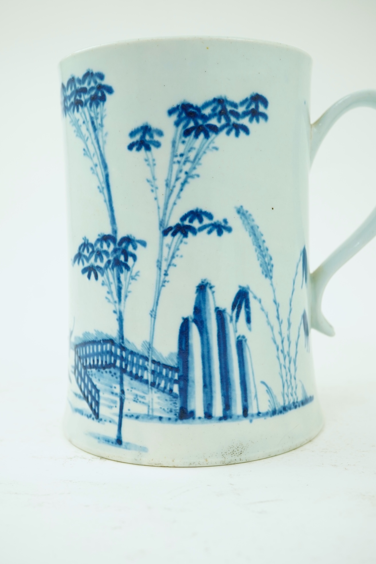 A large Worcester blue and white scratch cross type mug or tankard decorated in the Plantation pattern, c.1754-56